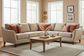 Christine 2-piece beige chenille sofa set styled in a warm transitional living room