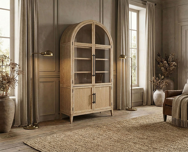 Minster arched accent cabinet in an elegant staged room